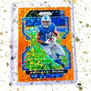AMON-RA ST.BROWN ROOKIE CARD ORANGE DISCO PANINI NFL DETROIT LIONS PRIZM